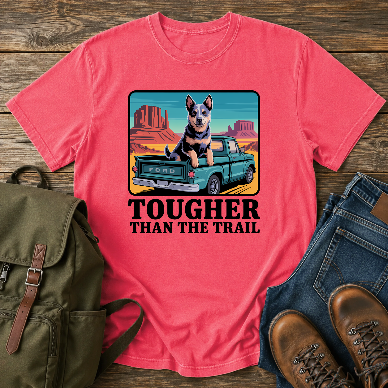 Blue Heeler dog riding in a vintage pickup truck on a desert overlanding t-shirt design.