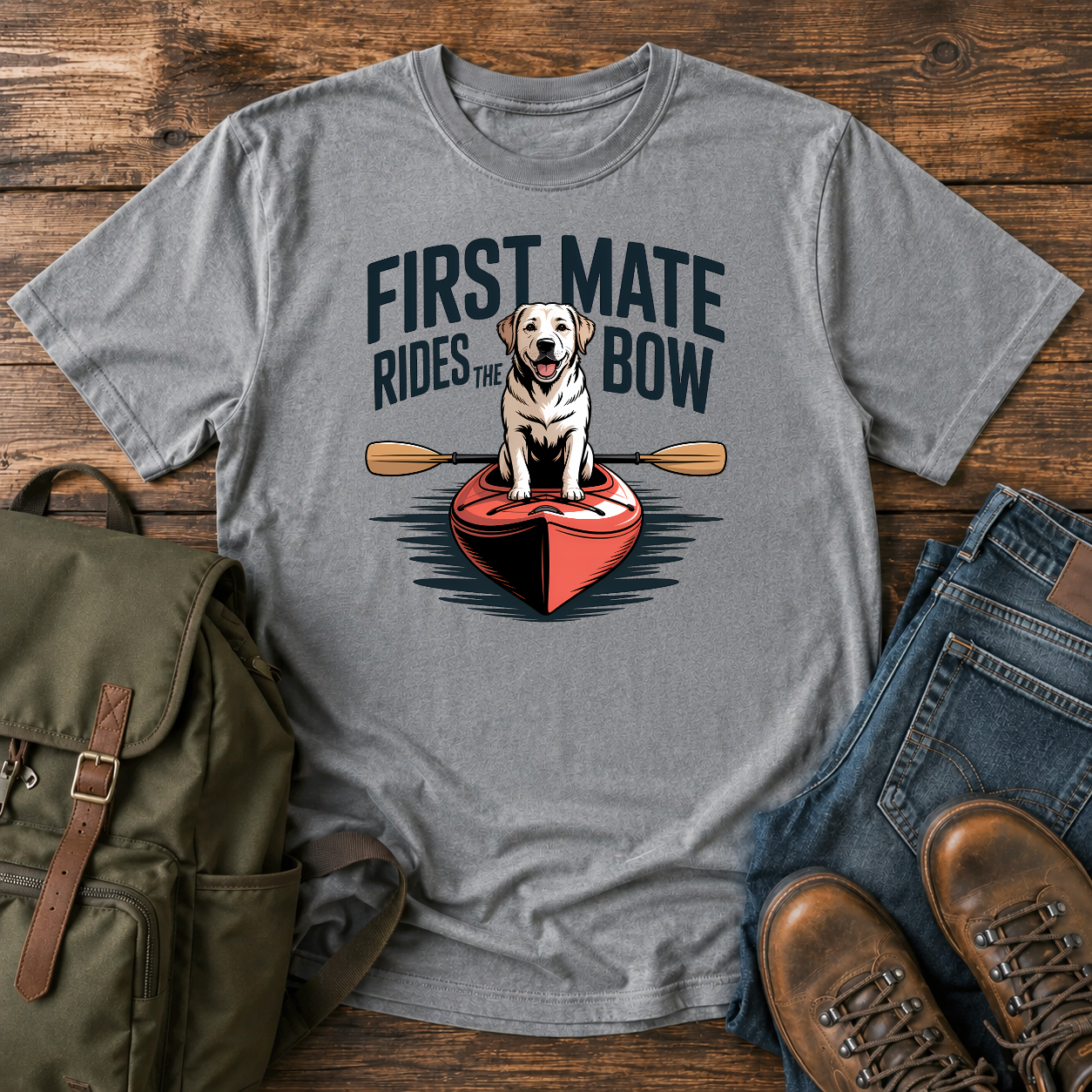 Labrador dog standing proudly on the bow of a kayak on a nautical water-dog t-shirt design.