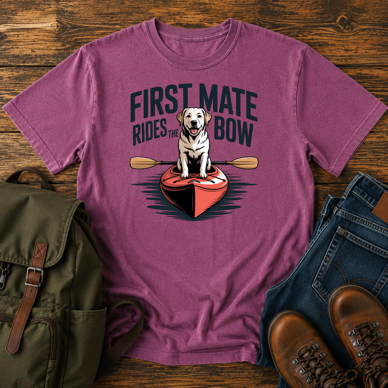 Labrador dog standing proudly on the bow of a kayak on a nautical water-dog t-shirt design.