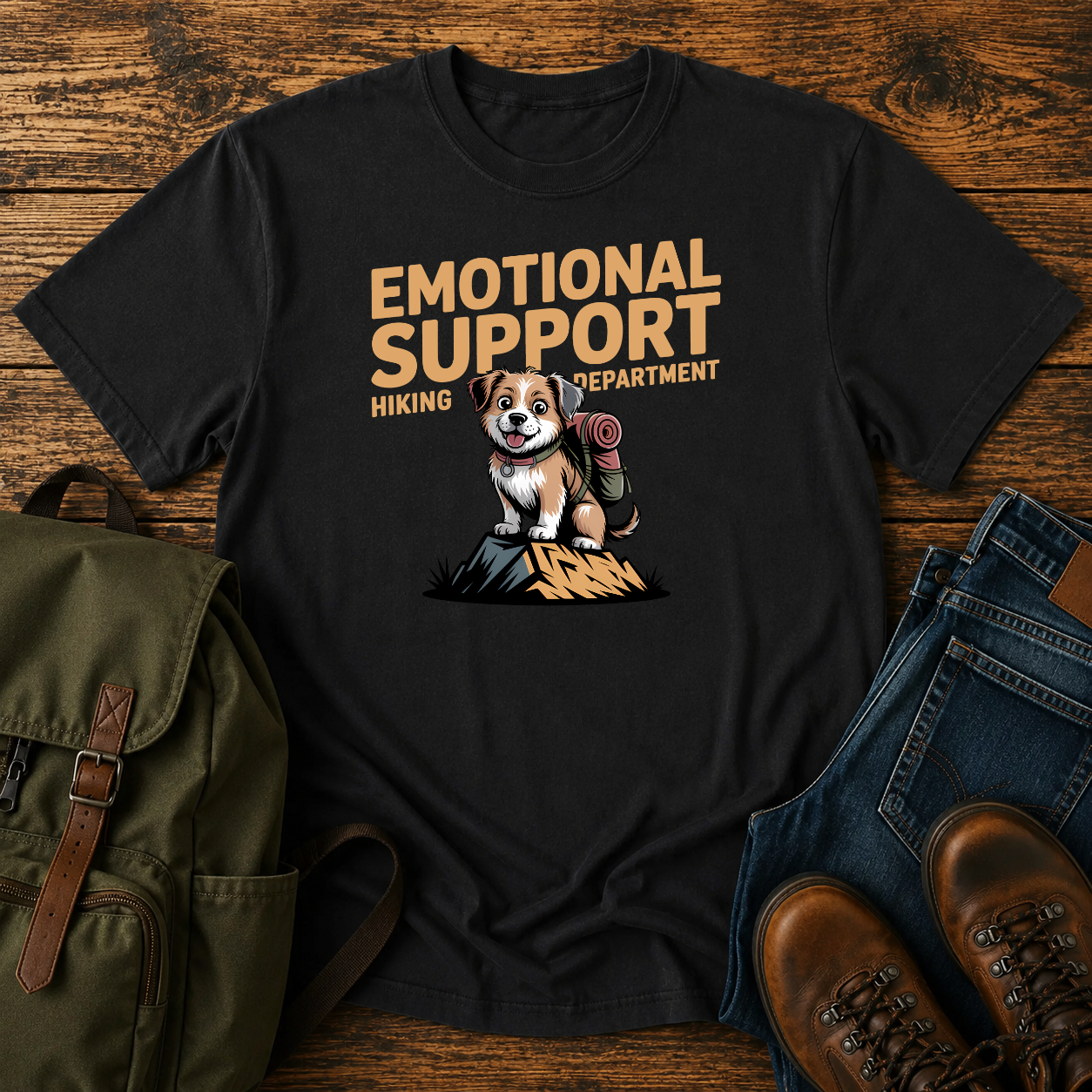 Scruffy rescue mutt riding in a backpack at a summit marker on a funny hiking t-shirt design.