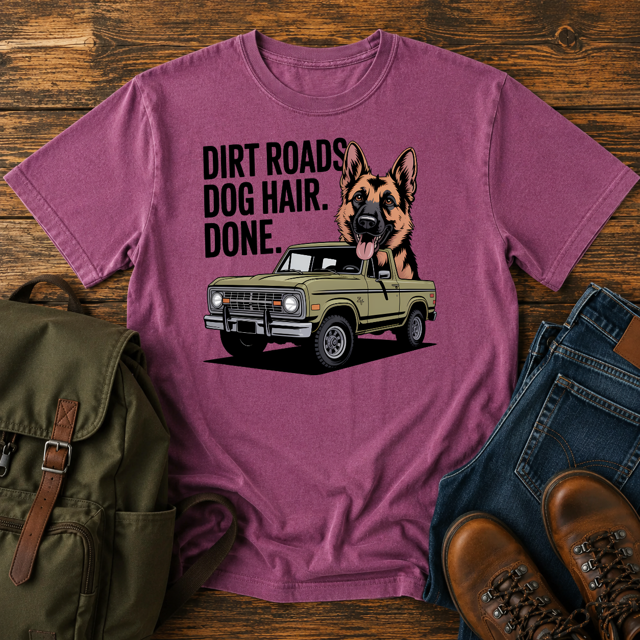German Shepherd dog with ears flapping out a vintage 4x4 truck window on a road-trip t-shirt design.