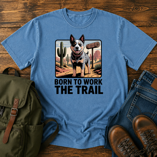 Australian Cattle Dog on rocky desert trail with vintage trail marker and bedroll on t-shirt
