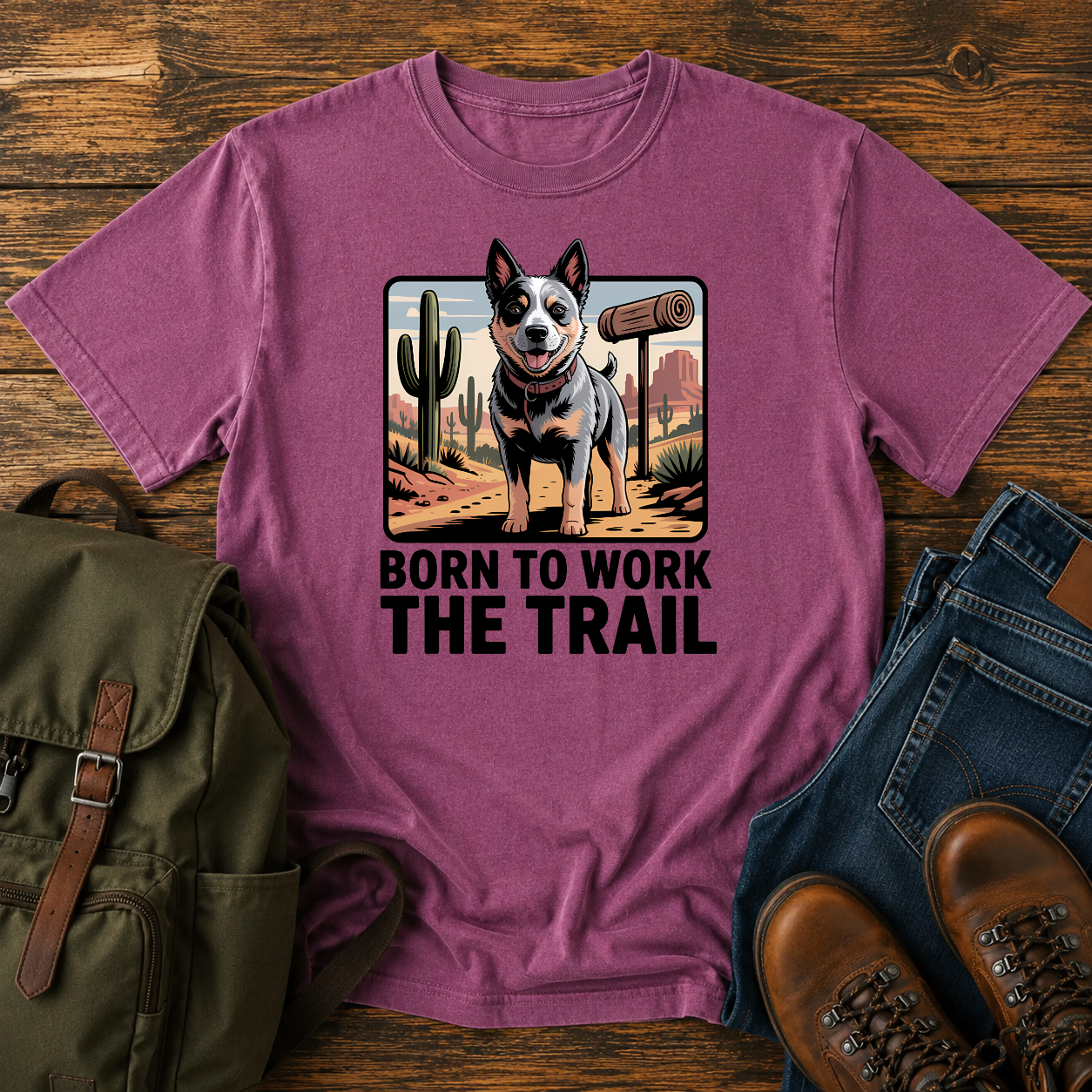 Australian Cattle Dog on rocky desert trail with vintage trail marker and bedroll on t-shirt
