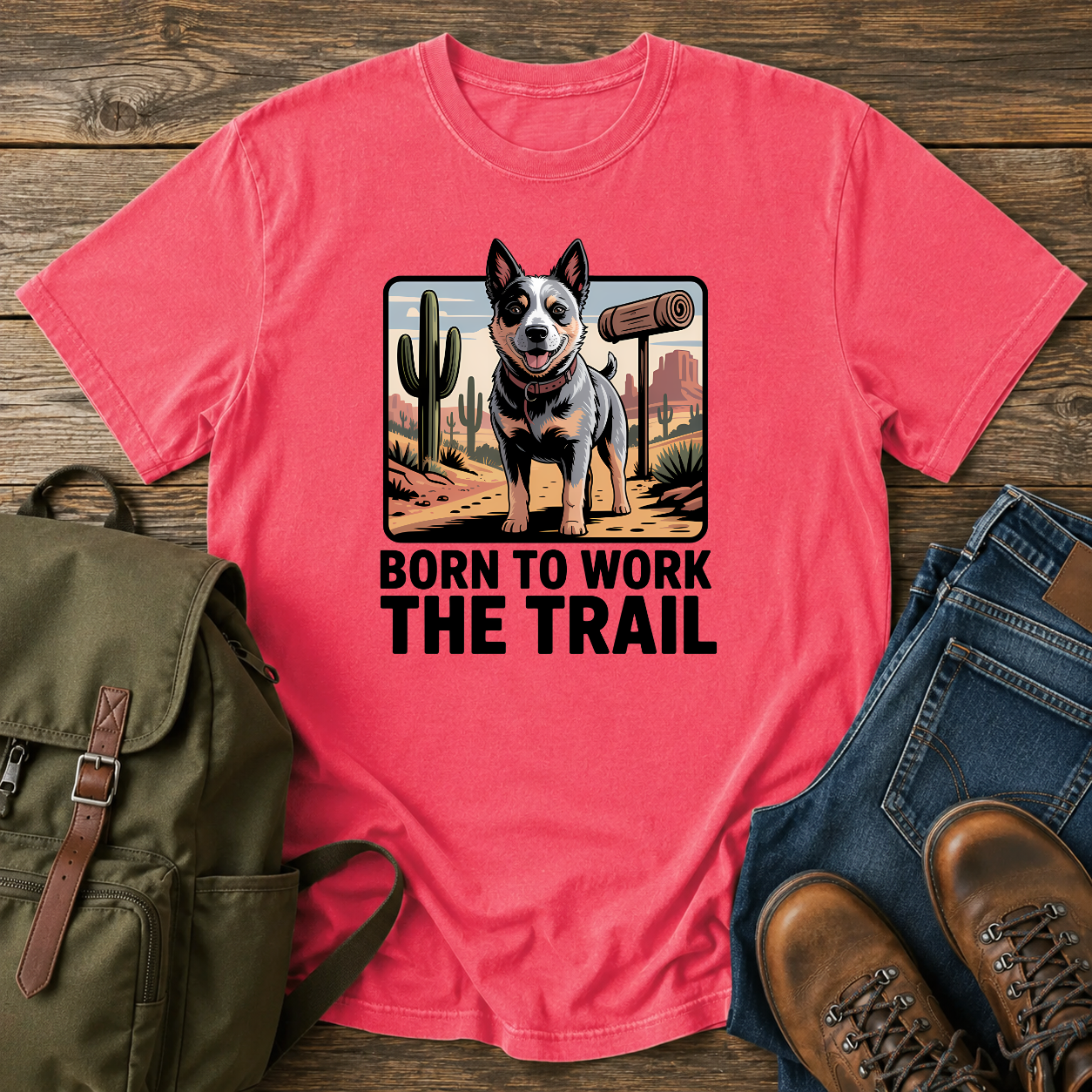 Australian Cattle Dog on rocky desert trail with vintage trail marker and bedroll on t-shirt