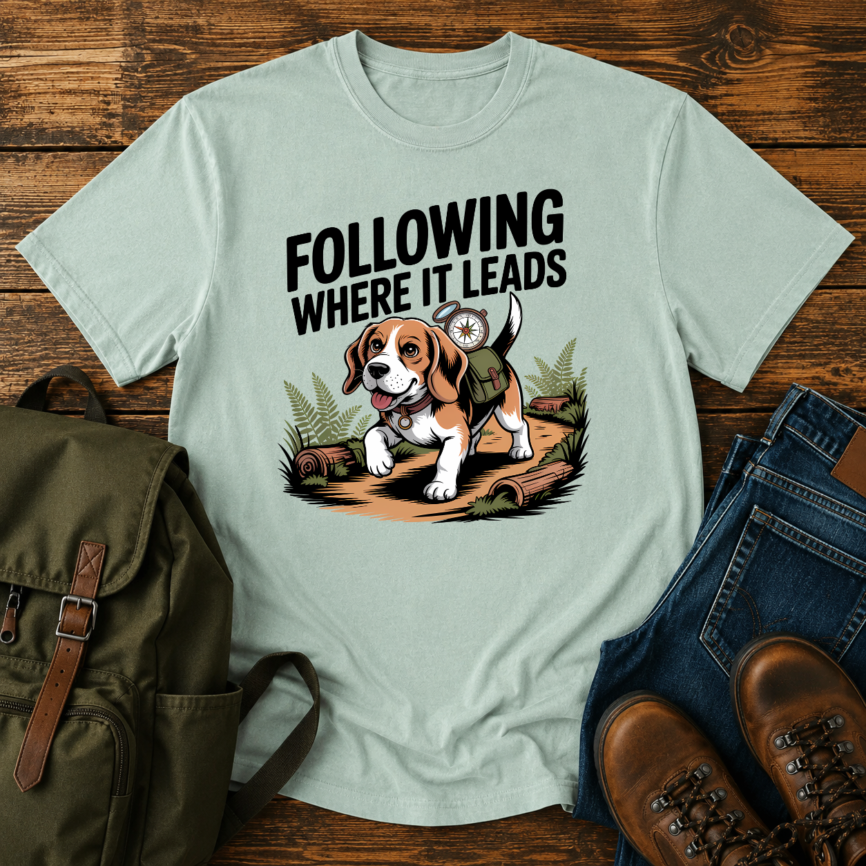 Determined Beagle following a scent trail through sun-dappled forest path on hiking t-shirt illustration