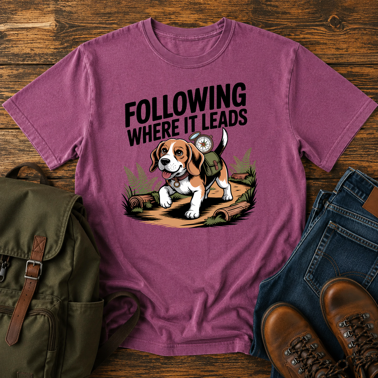 Determined Beagle following a scent trail through sun-dappled forest path on hiking t-shirt illustration