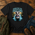 Smiling American Pit Bull Terrier with patriotic bandana standing in waterfall swimming hole on a vintage t-shirt.
