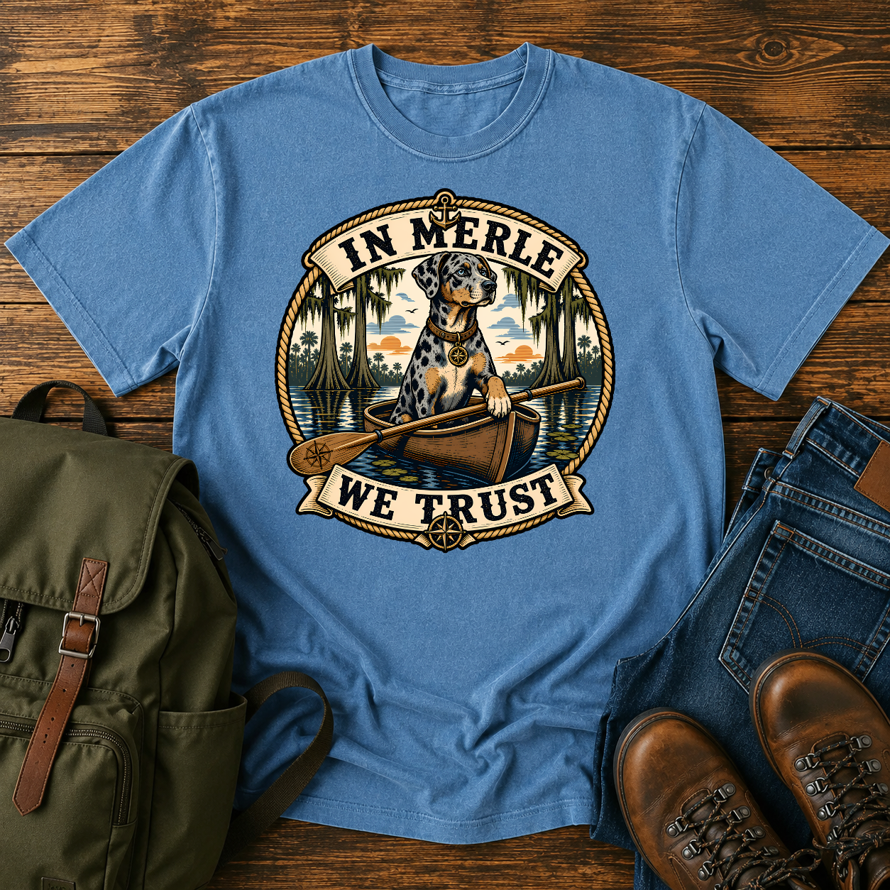 Nautical-style Catahoula Leopard Dog kayak shirt featuring a blue-merle dog paddling through cypress bayou.
