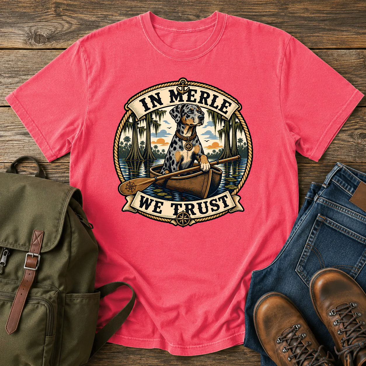 Nautical-style Catahoula Leopard Dog kayak shirt featuring a blue-merle dog paddling through cypress bayou.