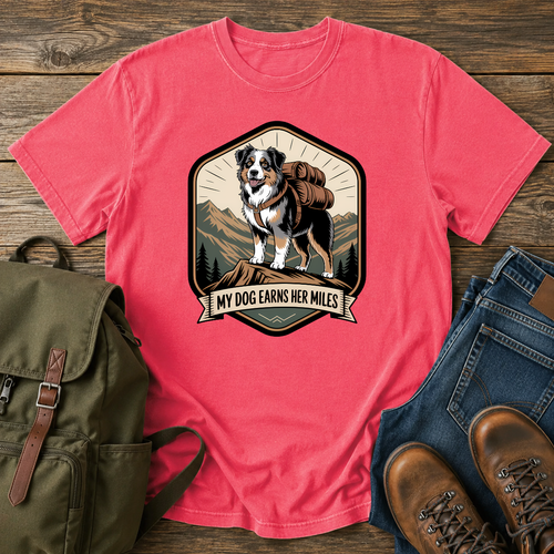 Retro trail-badge Australian Shepherd hiking shirt featuring an Aussie with a backpack on a mountain thru-hike trail.