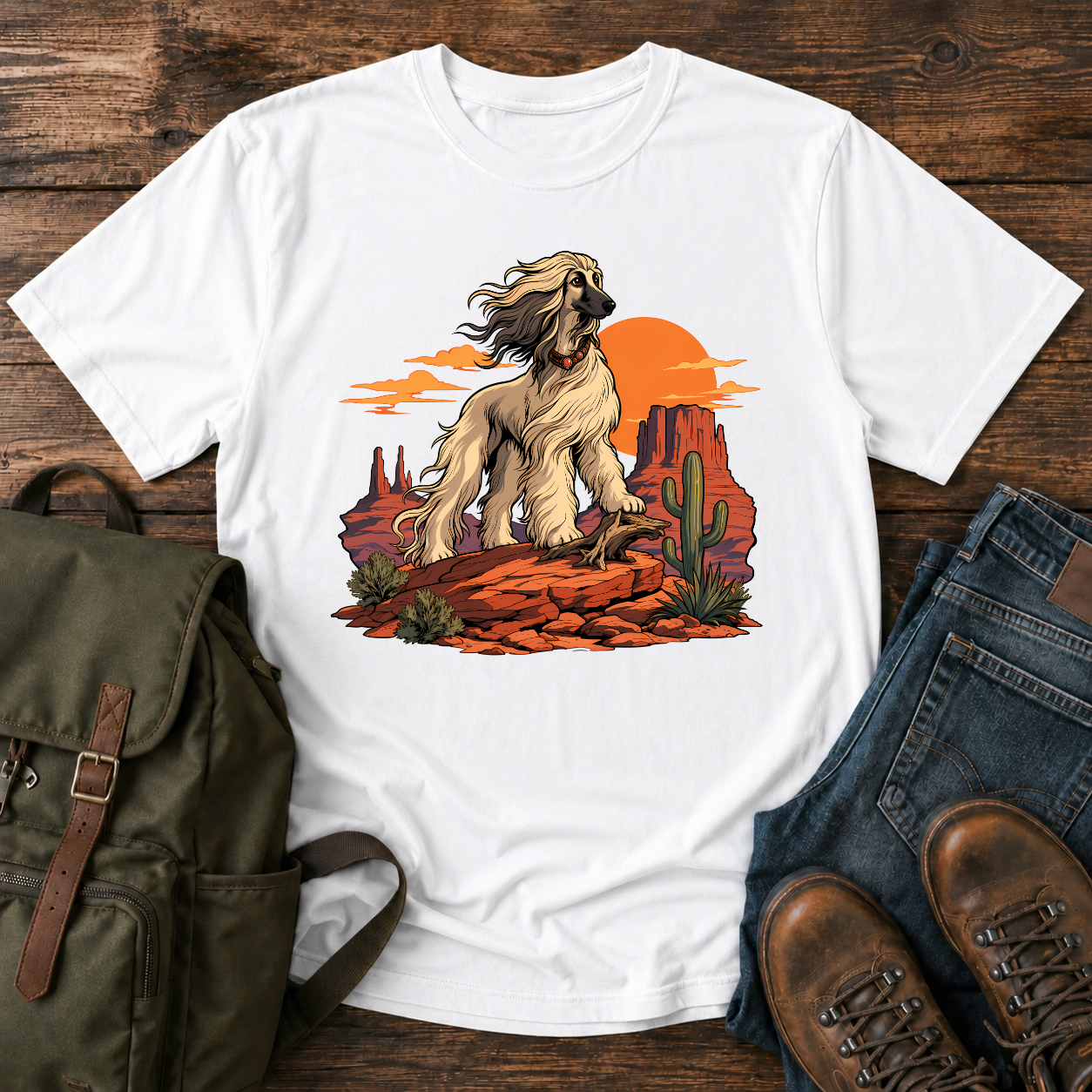 Afghan Hound standing on desert mesa rocks on a vintage western shirt.