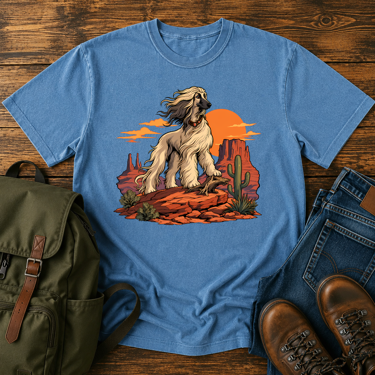 Afghan Hound standing on desert mesa rocks on a vintage western shirt.