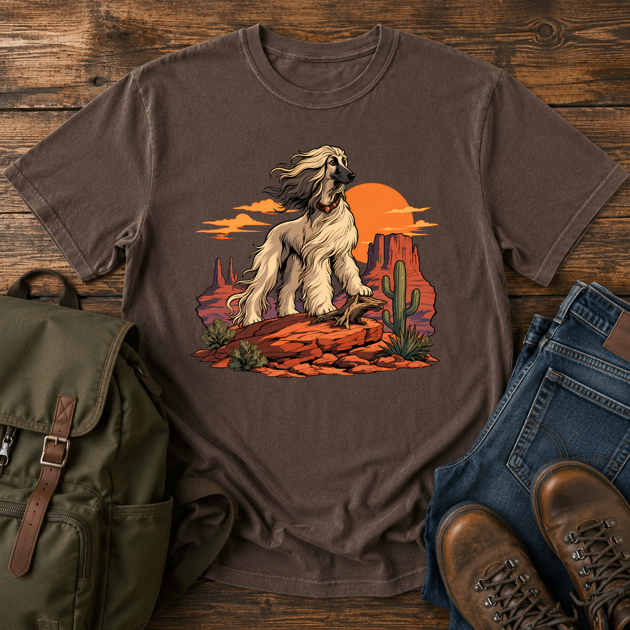 Afghan Hound standing on desert mesa rocks on a vintage western shirt.