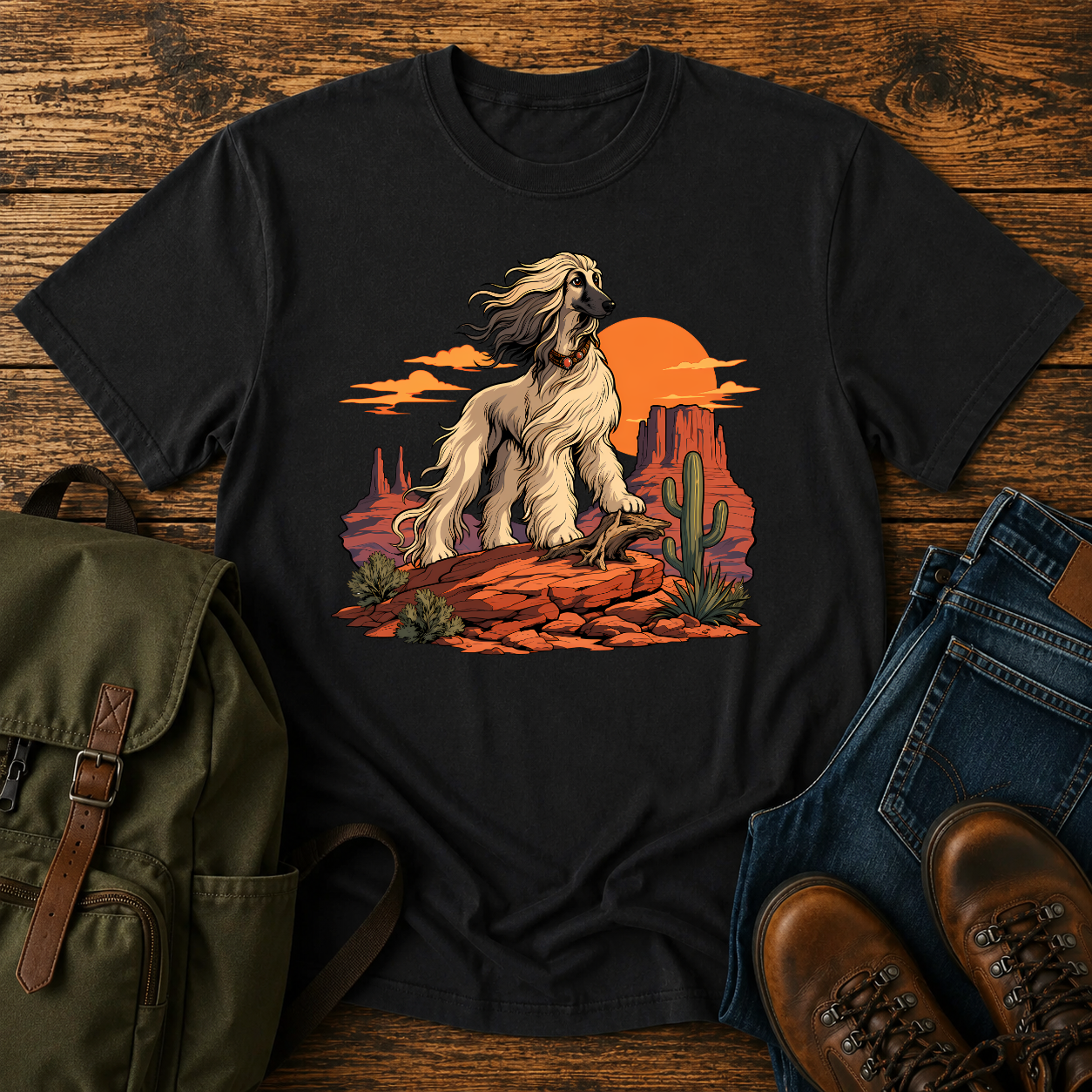 Afghan Hound standing on desert mesa rocks on a vintage western shirt.