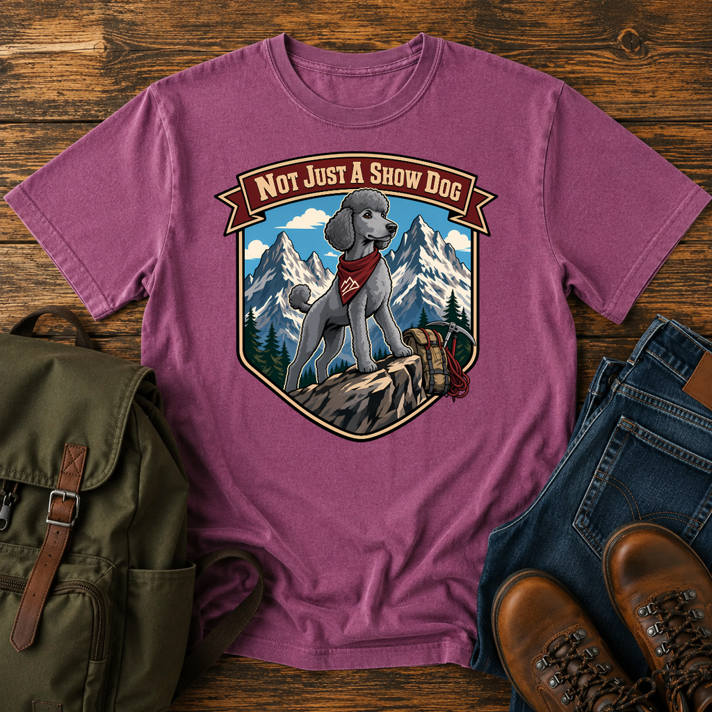 Standard Poodle in a sporty short clip cresting an alpine ridge wearing a bandana t-shirt design