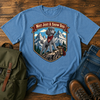 Standard Poodle in a sporty short clip cresting an alpine ridge wearing a bandana t-shirt design
