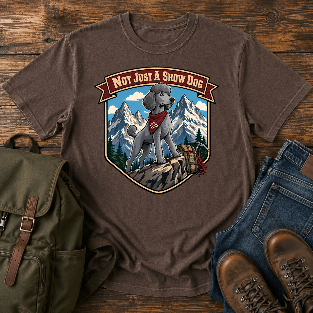 Standard Poodle in a sporty short clip cresting an alpine ridge wearing a bandana t-shirt design