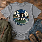 Cavalier King Charles Spaniel wearing a tiny life jacket sitting at the bow of a green t-shirt design