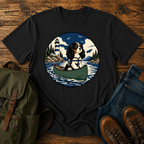 Cavalier King Charles Spaniel wearing a tiny life jacket sitting at the bow of a green t-shirt design