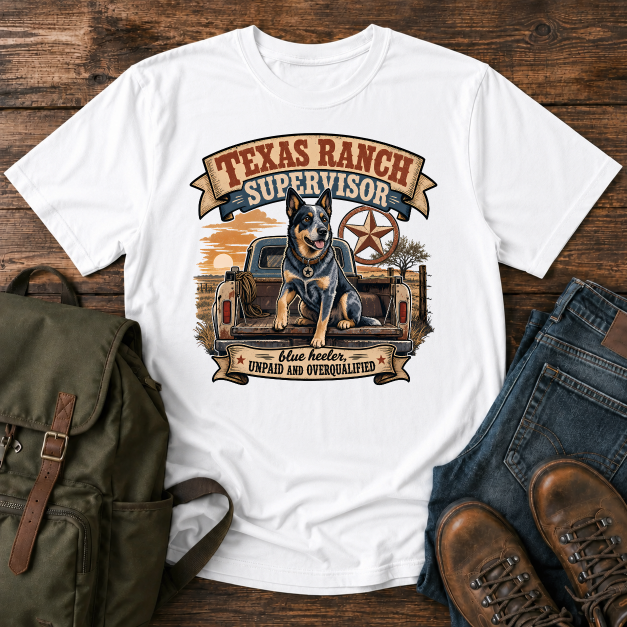 Blue Heeler perched alert on the tailgate of a dusty ranch truck at golden t-shirt design