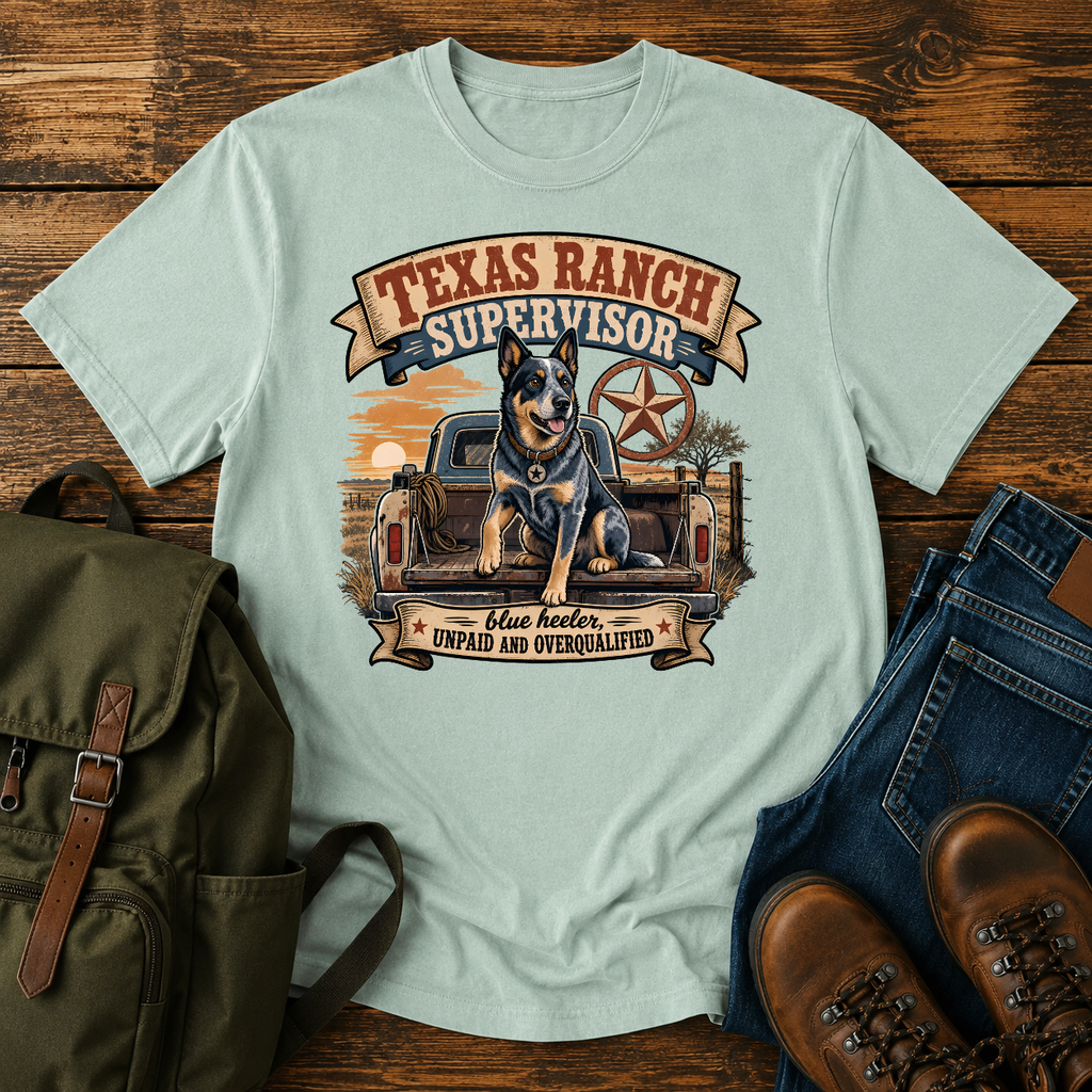Blue Heeler perched alert on the tailgate of a dusty ranch truck at golden t-shirt design