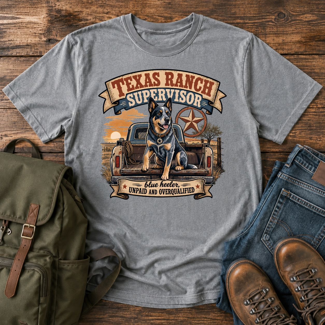 Blue Heeler perched alert on the tailgate of a dusty ranch truck at golden t-shirt design
