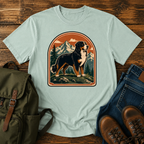 Bernese Mountain Dog Wordless: tricolor Bernese standing broadside on an alpine meadow ridge, layered peaks t-shirt design