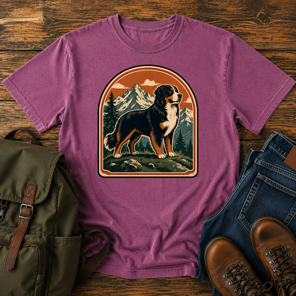 Bernese Mountain Dog Wordless: tricolor Bernese standing broadside on an alpine meadow ridge, layered peaks t-shirt design