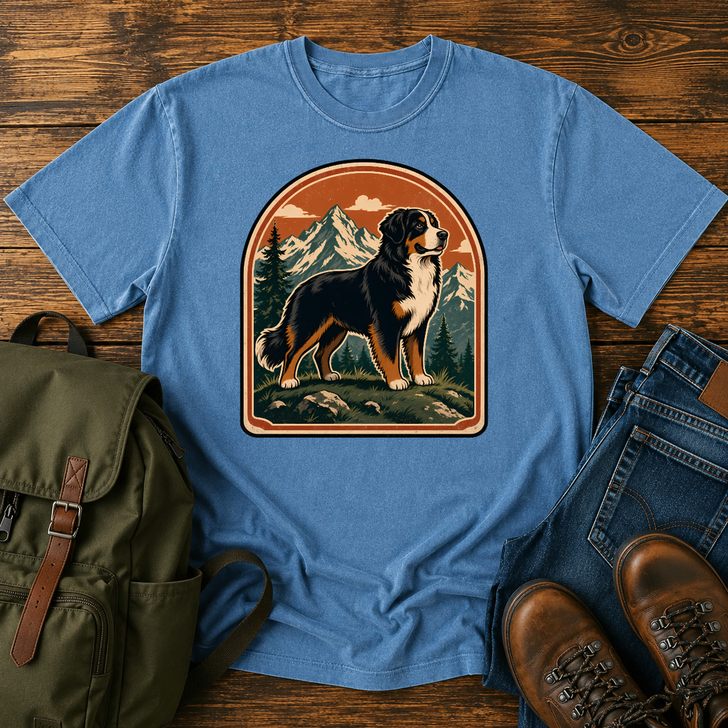 Bernese Mountain Dog Wordless: tricolor Bernese standing broadside on an alpine meadow ridge, layered peaks t-shirt design