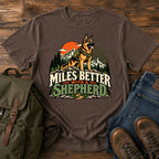 German Shepherd Miles Better slogan with outdoor dog portrait on a t-shirt design