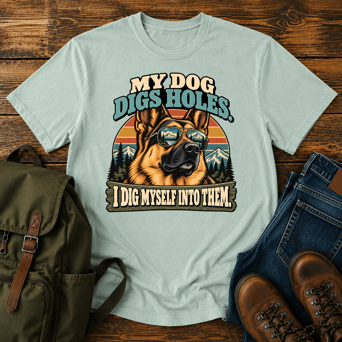 German Shepherd mountain digging joke with alpine dog scene on a t-shirt design