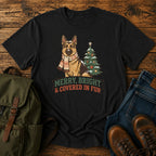 German Shepherd Christmas t-shirt design with scarfed dog beside a decorated tree.