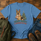 German Shepherd Christmas t-shirt design with scarfed dog beside a decorated tree.