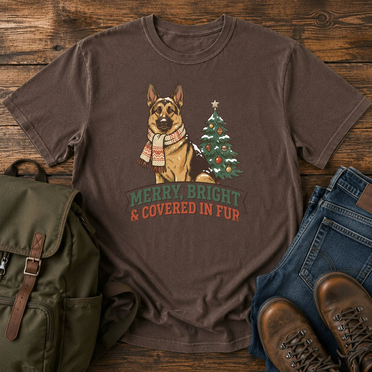 German Shepherd Christmas t-shirt design with scarfed dog beside a decorated tree.