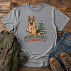 German Shepherd Christmas t-shirt design with scarfed dog beside a decorated tree.