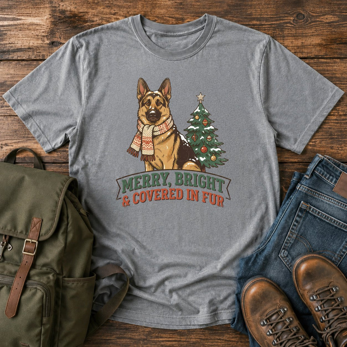 German Shepherd Christmas t-shirt design with scarfed dog beside a decorated tree.
