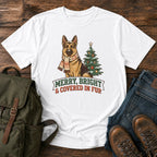 German Shepherd Christmas t-shirt design with scarfed dog beside a decorated tree.