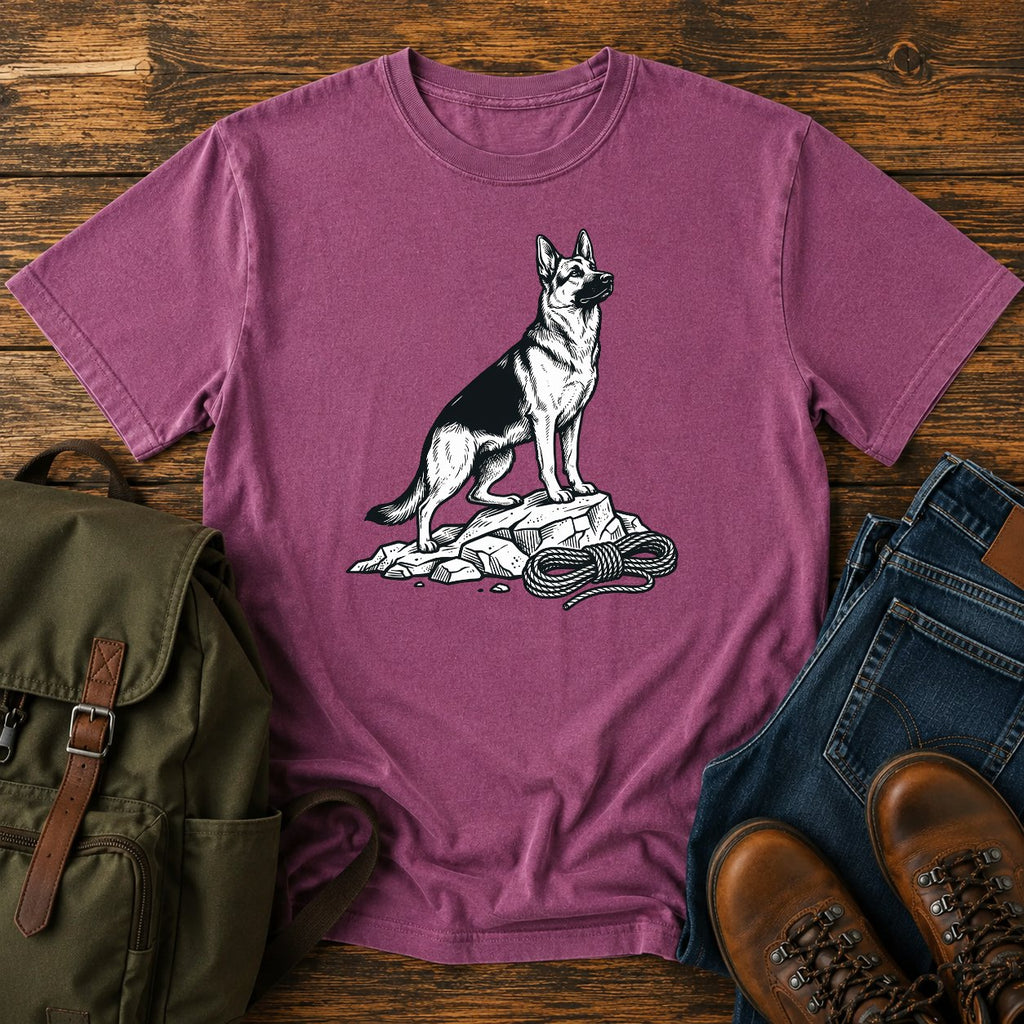 German Shepherd climbing crag scout t-shirt design with dog on rocky outcrop