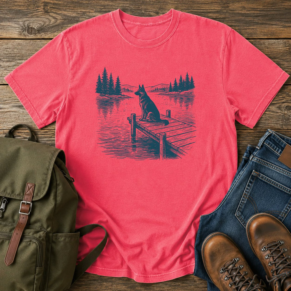 German Shepherd dock watch t-shirt design with alert dog by calm summer water.