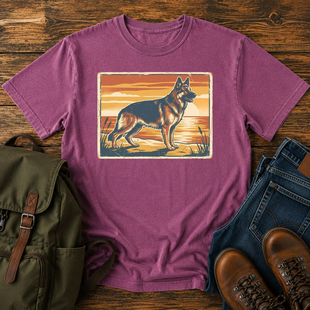 German Shepherd lake sunset t-shirt design with dog standing at the waterline.