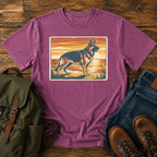 German Shepherd lake sunset t-shirt design with dog standing at the waterline.