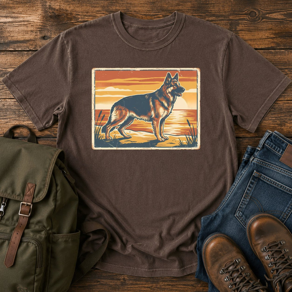 German Shepherd lake sunset t-shirt design with dog standing at the waterline.