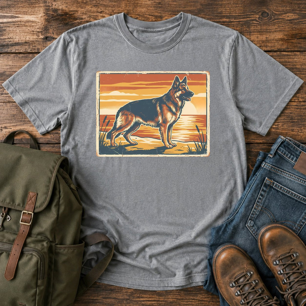 German Shepherd lake sunset t-shirt design with dog standing at the waterline.