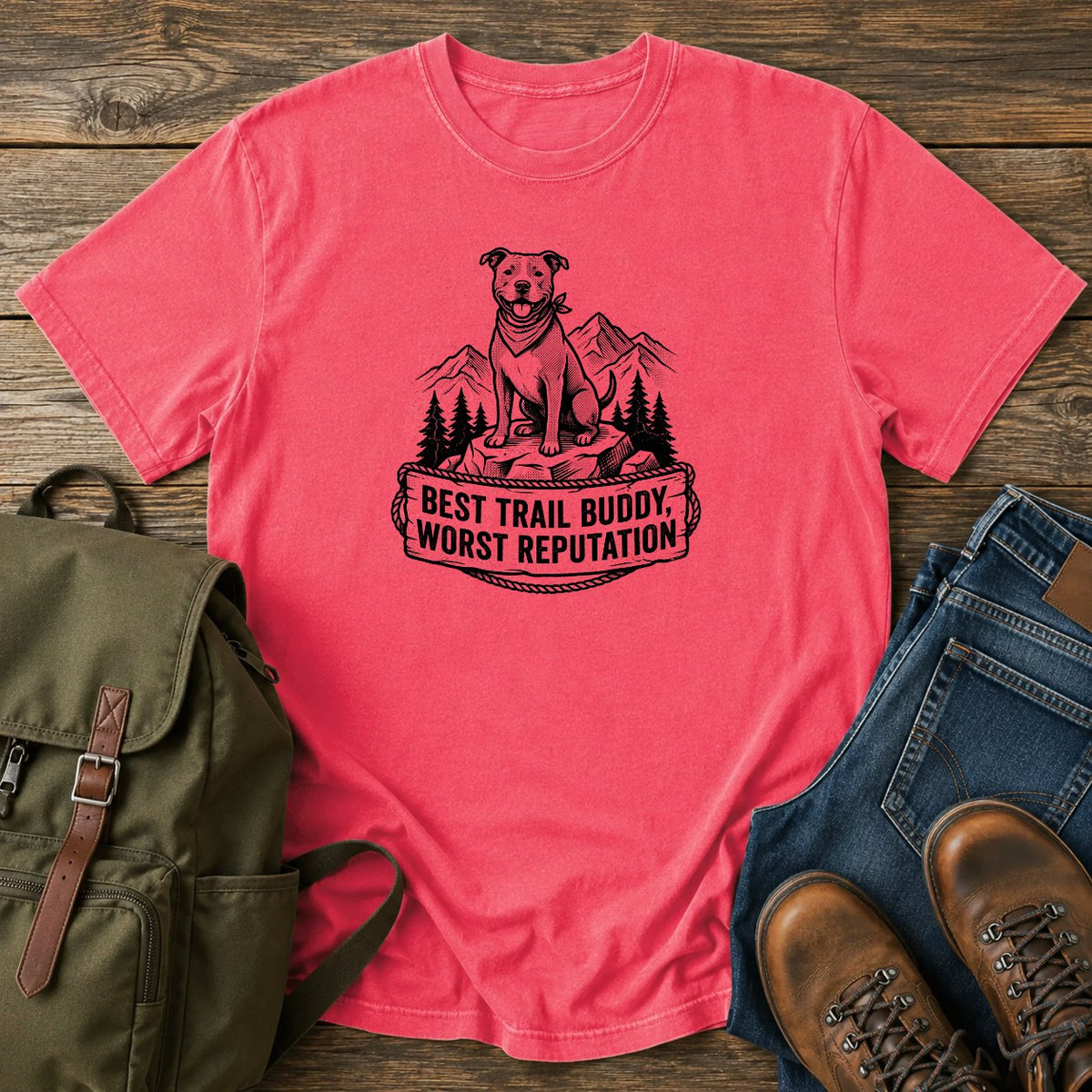 Pit Bull best trail buddy t-shirt design — smiling pit bull hiking with mountain trail badge, "Best Trail Buddy, Worst Reputation"